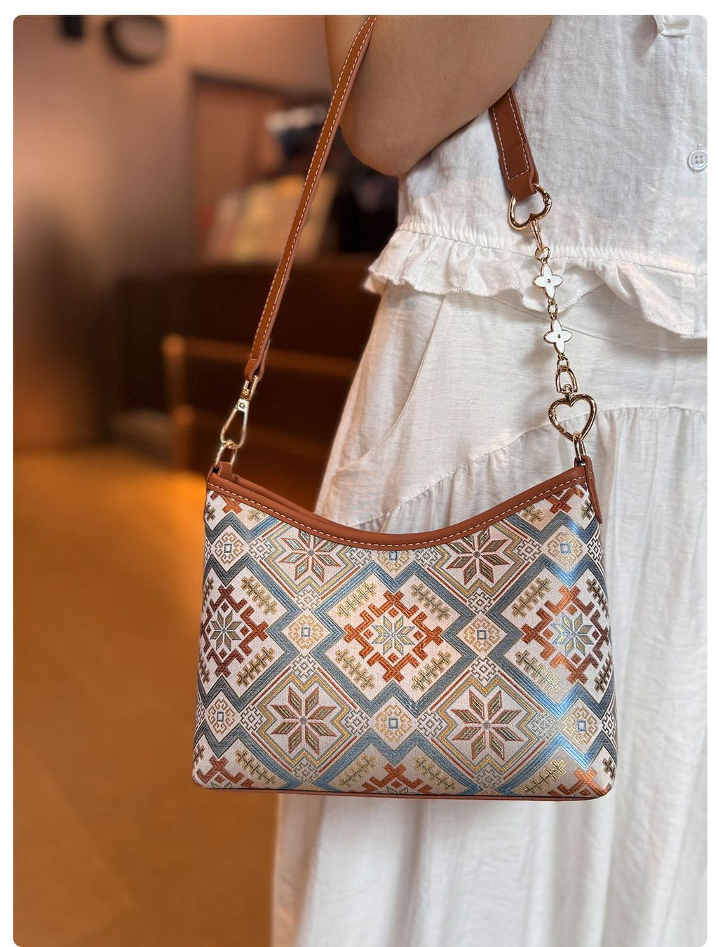 The Heritage Brocade Small Hobo: Handcrafted Ethnic Underarm Bag with Chain Accent