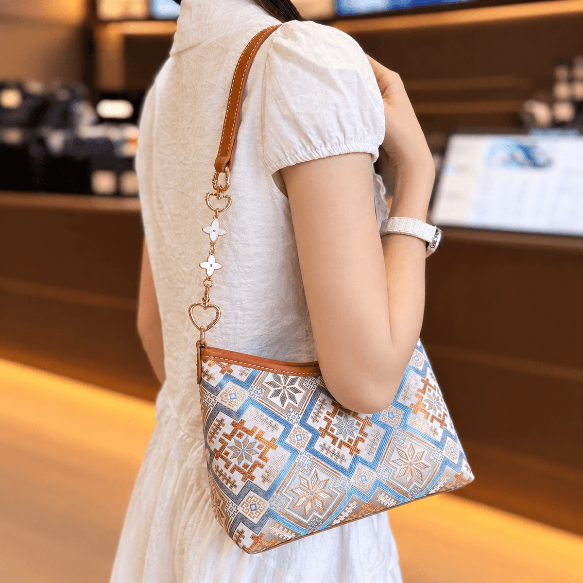 The Heritage Brocade Small Hobo: Handcrafted Ethnic Underarm Bag with Chain Accent