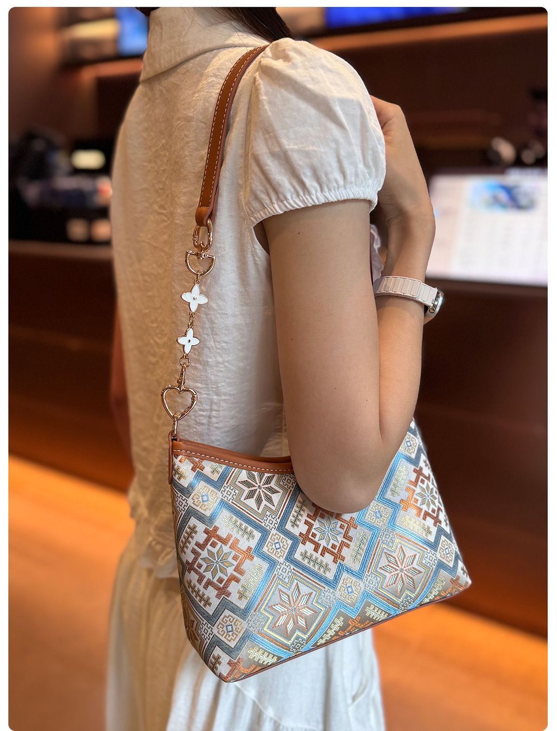 The Heritage Brocade Small Hobo: Handcrafted Ethnic Underarm Bag with Chain Accent